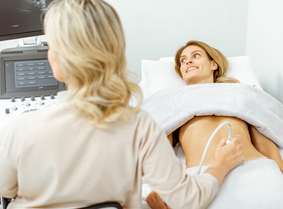 doctor-performs-ultrasound-examination-of-a-woman